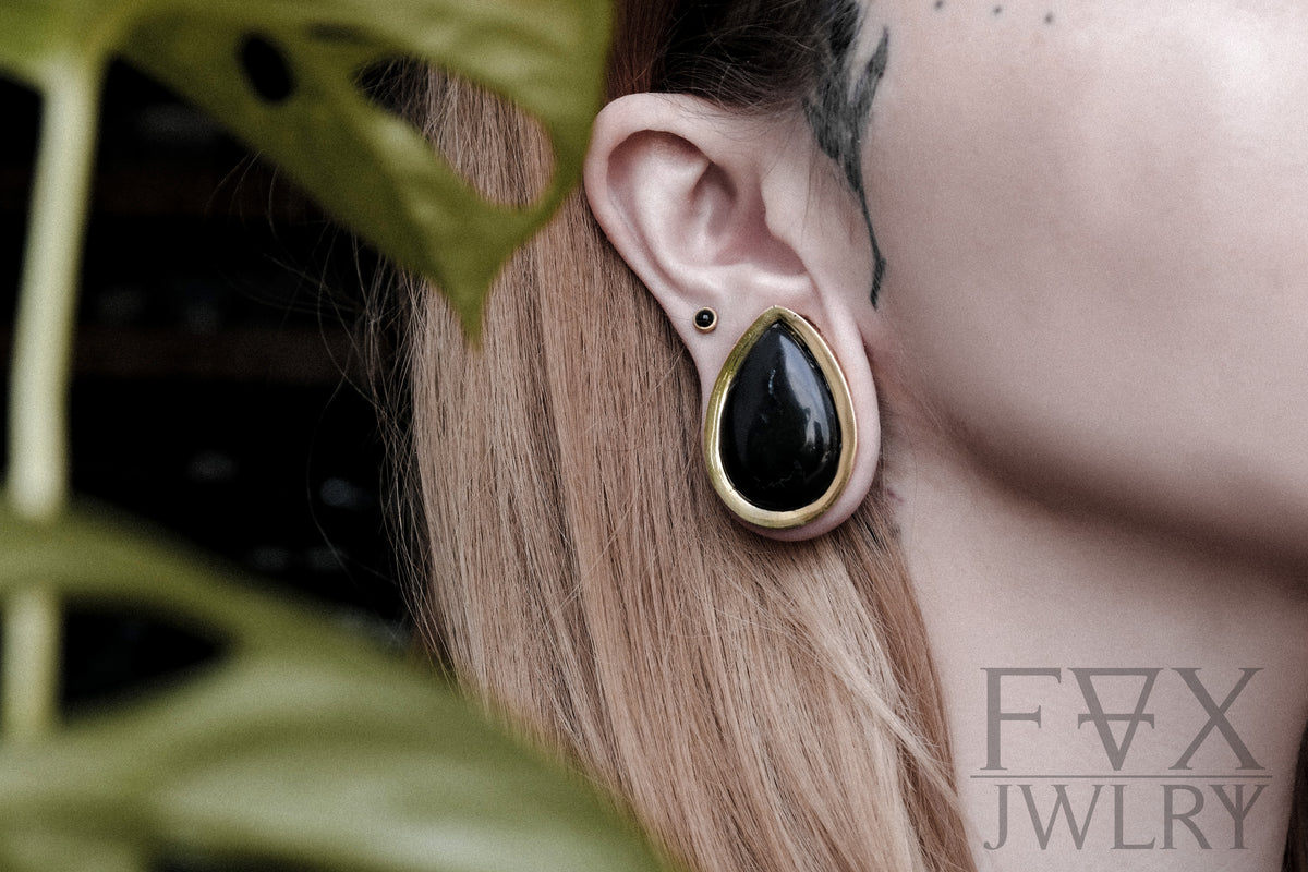 Goldene Onyx Tropfen Plugs